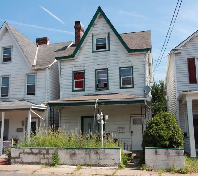 814 Etna St, Mckees Rocks, PA 15136 - view of front of home featuring a porch, a chimney, and roof with shingles
