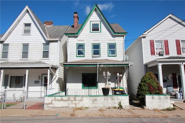 814 Etna St, Mckees Rocks, PA 15136 - view of front of property featuring covered porch and a chimney