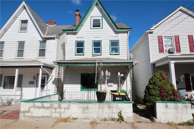 814 Etna St, Mckees Rocks, PA 15136 - view of front of home featuring covered porch and a chimney