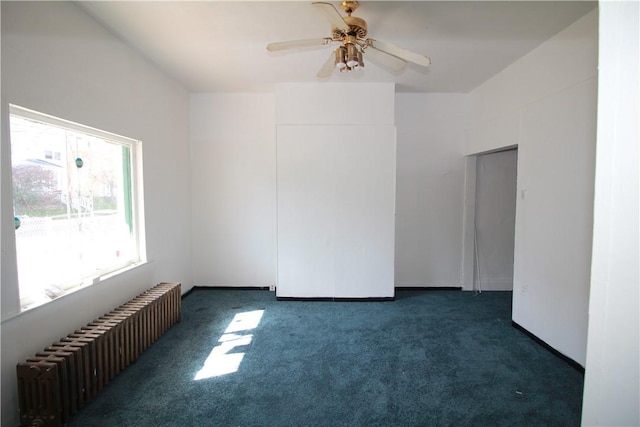 814 Etna St, Mckees Rocks, PA 15136 - carpeted empty room with radiator heating unit and a ceiling fan