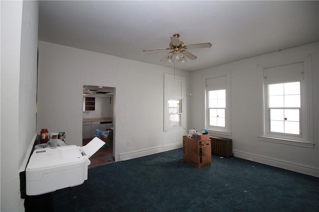 814 Etna St, Mckees Rocks, PA 15136 - unfurnished office featuring radiator heating unit, ceiling fan, carpet flooring, and baseboards
