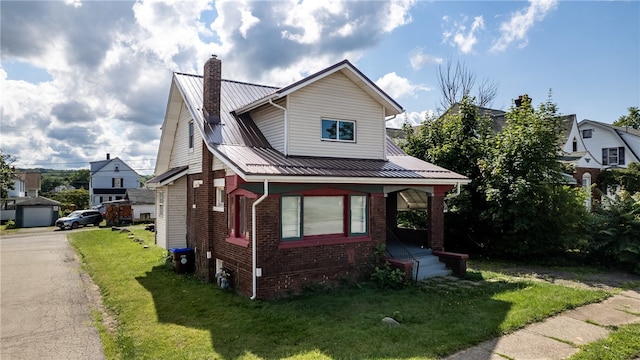 view of front of house featuring central AC unit and a front yard