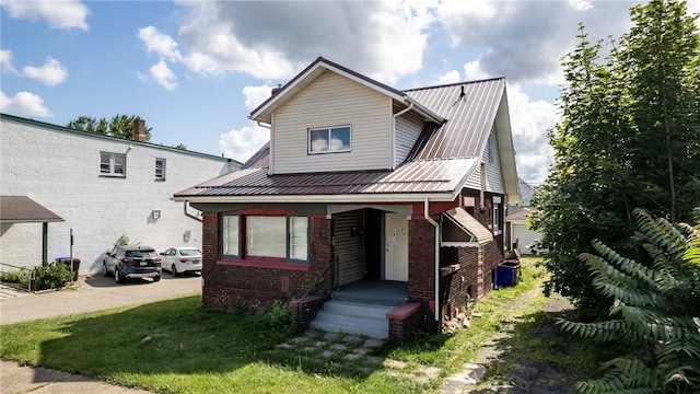 view of front of home with a front yard