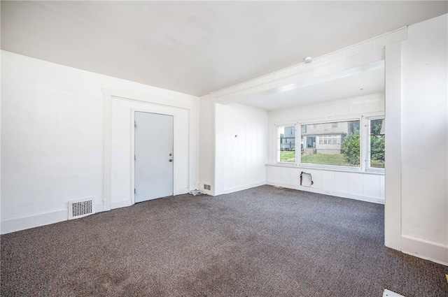 empty room with carpet flooring