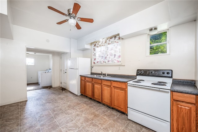 kitchen featuring light tile patterned floors, ceiling fan, plenty of natural light, and white appliances