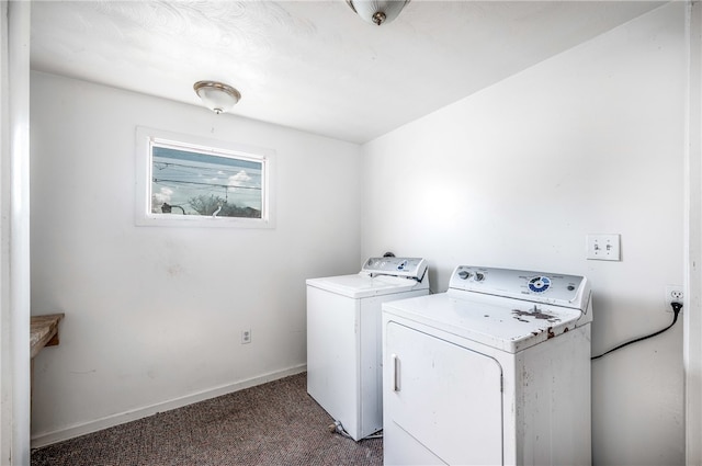 laundry room featuring carpet and washing machine and clothes dryer