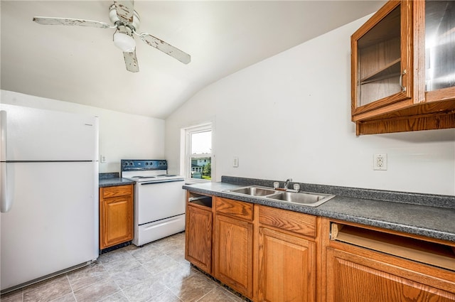 kitchen with ceiling fan, white appliances, sink, vaulted ceiling, and light tile patterned floors