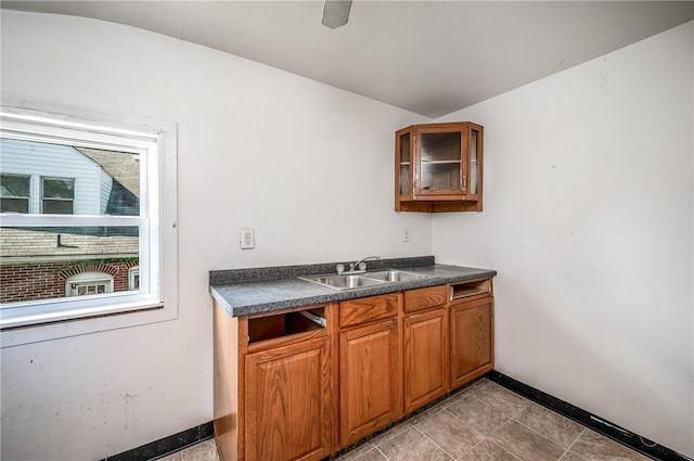 kitchen with sink and light tile patterned floors