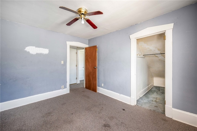 unfurnished bedroom with a closet, carpet flooring, and ceiling fan