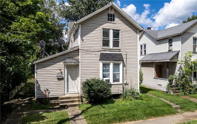 view of front property featuring a front yard