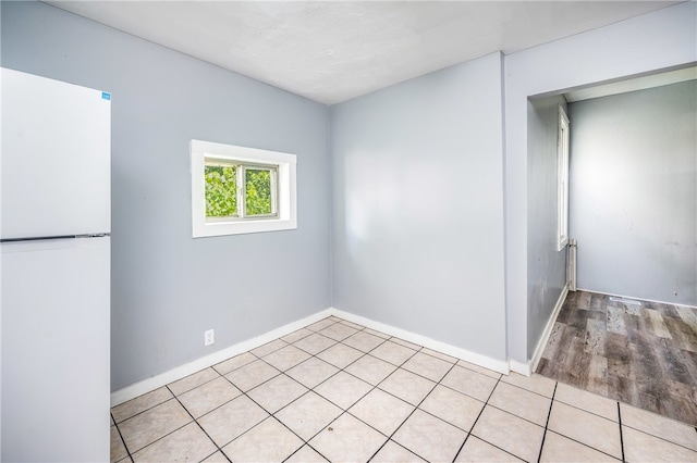 empty room featuring light hardwood / wood-style floors