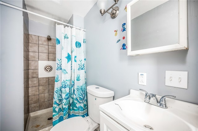 bathroom featuring vanity, walk in shower, and toilet