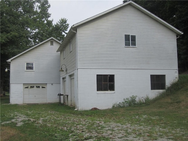 view of home's exterior featuring an attached garage