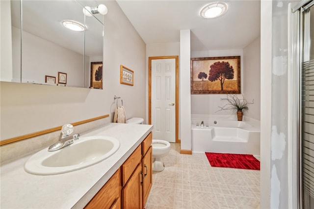 bathroom featuring vanity, tile patterned flooring, a bathtub, and toilet