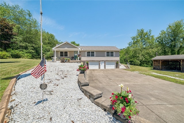 ranch-style home with a carport, a garage, and a front yard