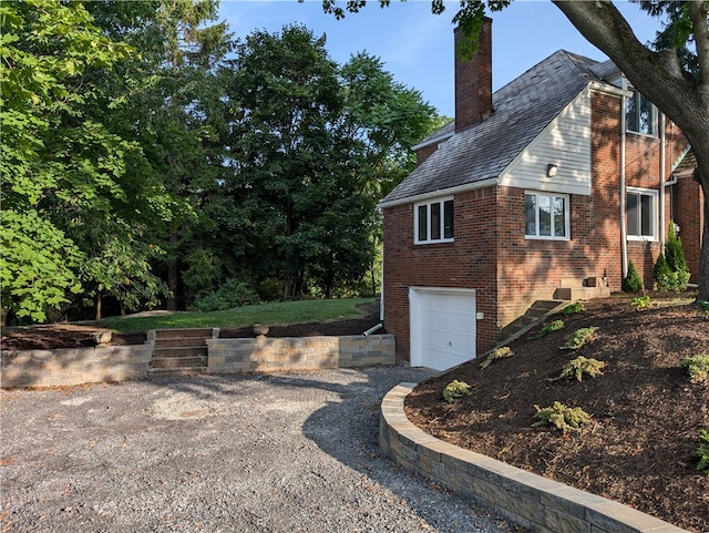 view of home's exterior featuring a garage