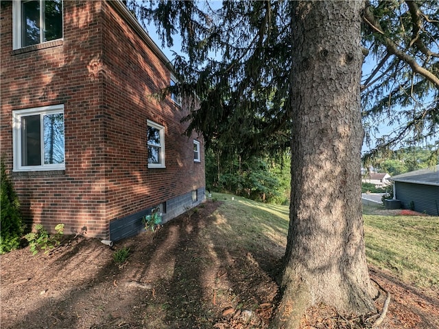 view of property exterior featuring a yard