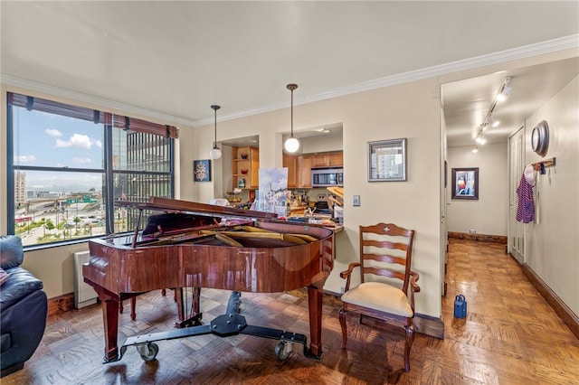112 Washington Pl Unit 7E, Downtown Pgh, PA 15219 - sitting room with baseboards, track lighting, and ornamental molding