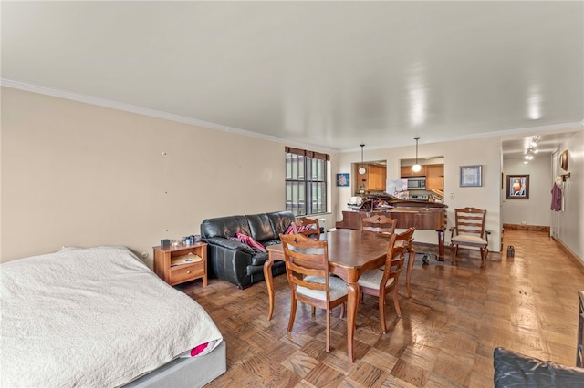 112 Washington Pl Unit 7E, Downtown Pgh, PA 15219 - dining area featuring crown molding and baseboards
