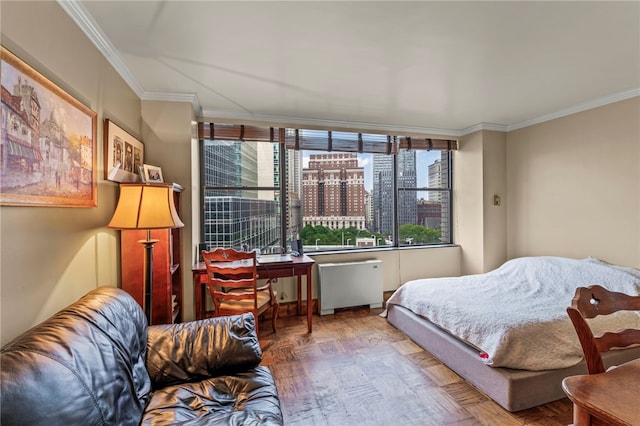112 Washington Pl Unit 7E, Downtown Pgh, PA 15219 - bedroom featuring crown molding, radiator, and a city view
