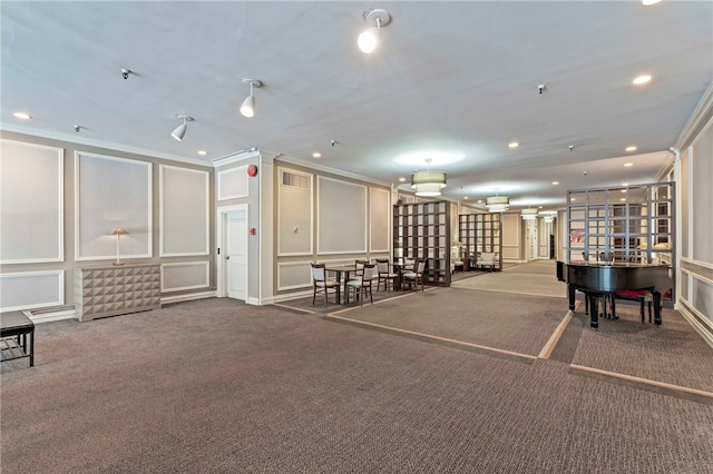 112 Washington Pl Unit 7E, Downtown Pgh, PA 15219 - miscellaneous room with a decorative wall, carpet floors, crown molding, and recessed lighting