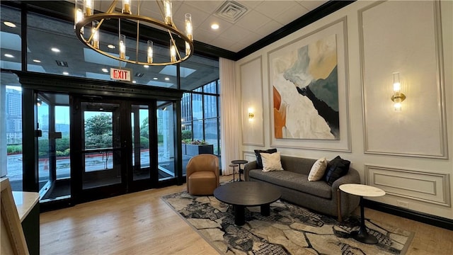 112 Washington Pl Unit 7E, Downtown Pgh, PA 15219 - lobby featuring ornamental molding and a decorative wall