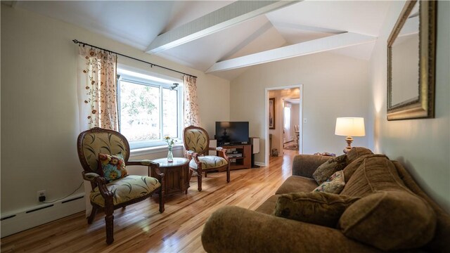 living room with baseboard heating, lofted ceiling with beams, and light wood-type flooring