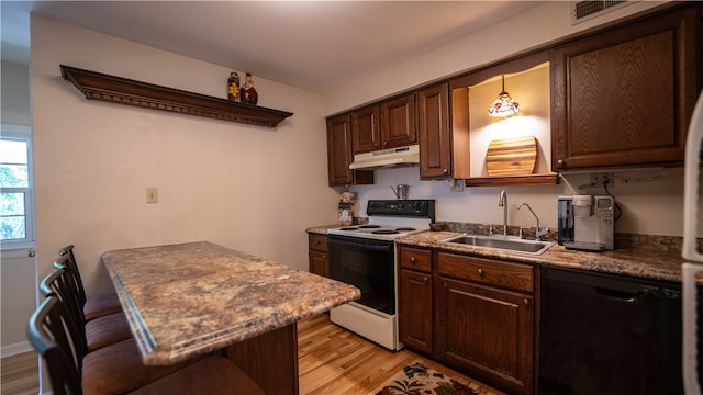 kitchen featuring white range with electric cooktop, sink, light hardwood / wood-style floors, decorative light fixtures, and dishwasher