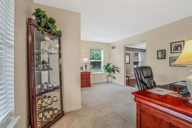 view of carpeted office space