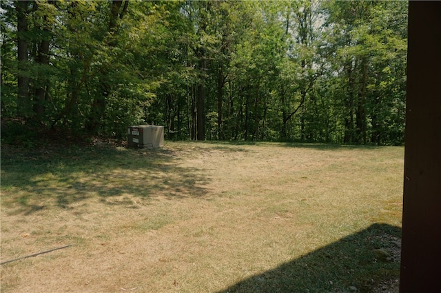 view of yard featuring a view of trees