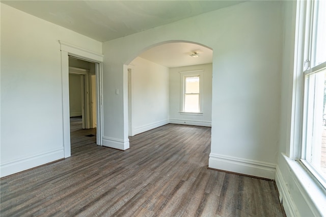 empty room with hardwood / wood-style flooring