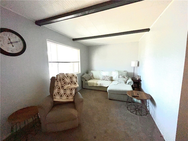 living room featuring carpet and beamed ceiling