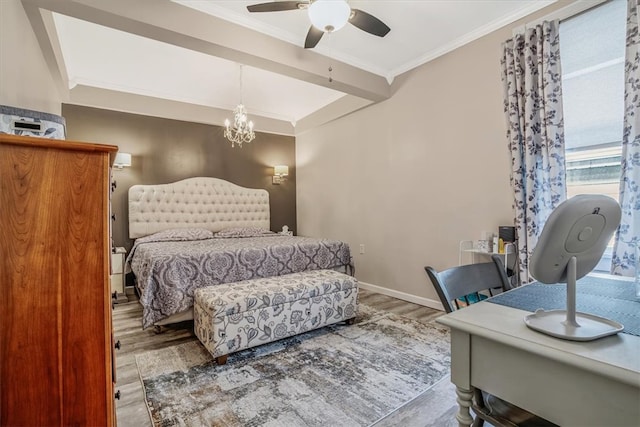 bedroom featuring ceiling fan with notable chandelier, crown molding, and hardwood / wood-style floors