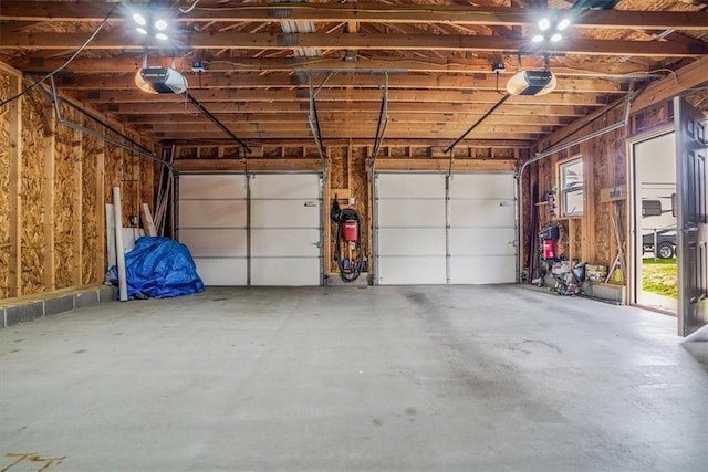 garage featuring a garage door opener