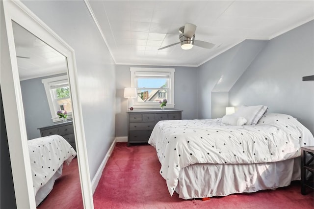 bedroom featuring ceiling fan, dark carpet, and crown molding