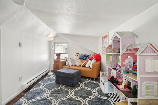 game room featuring dark wood-type flooring, a baseboard radiator, a textured ceiling, and lofted ceiling