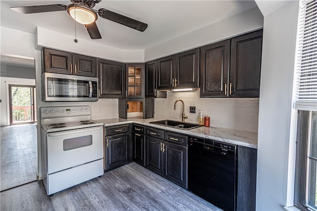 kitchen with ceiling fan, white electric range, sink, dishwasher, and backsplash