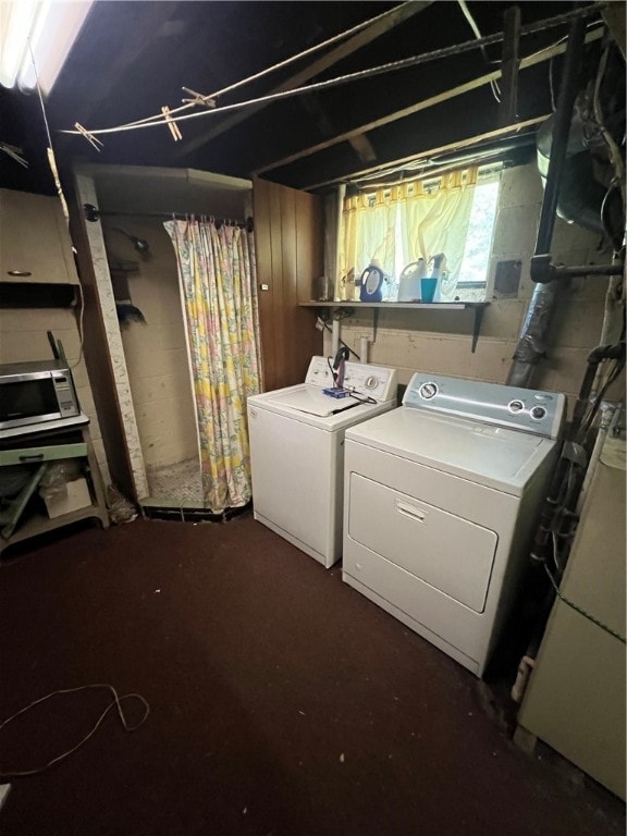 basement with washer and dryer