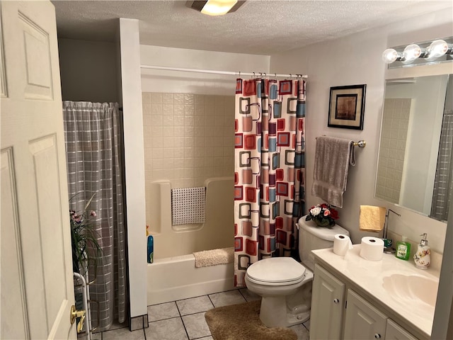 full bathroom with vanity, shower / tub combo, toilet, a textured ceiling, and tile patterned flooring