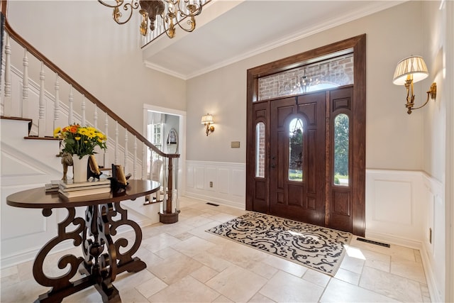 entryway with crown molding