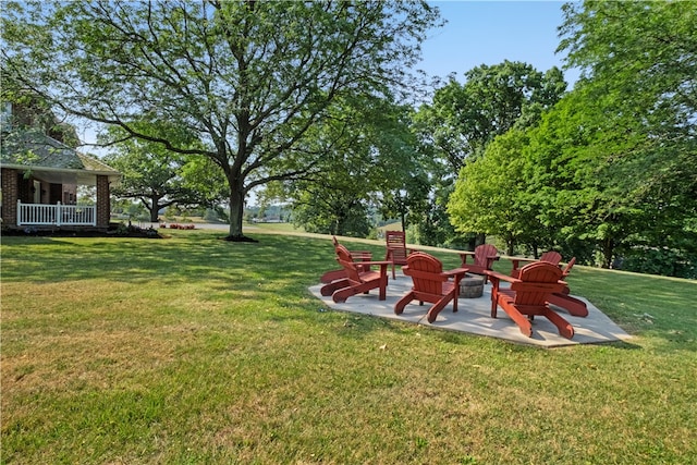 view of yard with a patio area and a fire pit