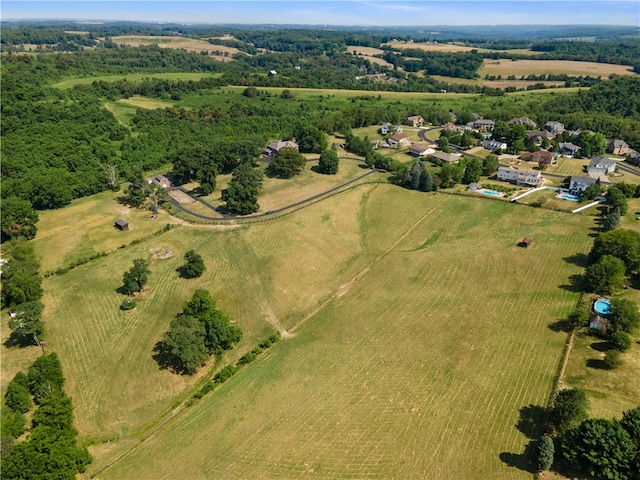 birds eye view of property featuring a rural view