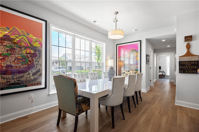 dining room featuring hardwood / wood-style flooring