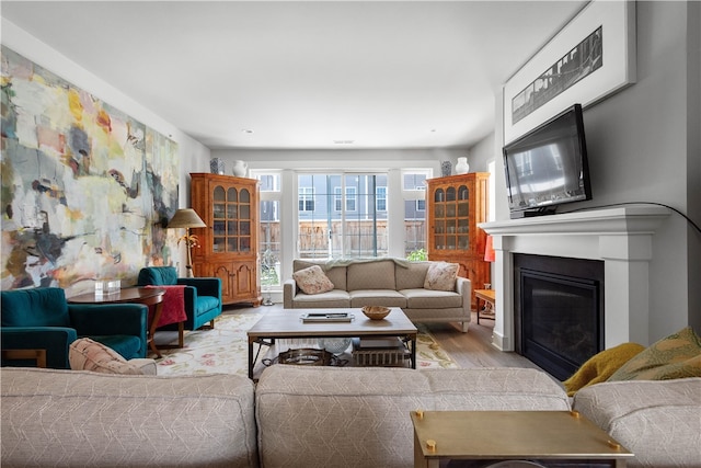 living room with light hardwood / wood-style floors