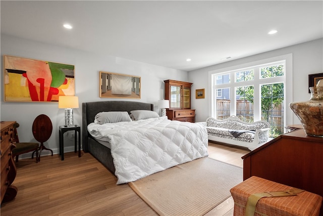 bedroom featuring hardwood / wood-style flooring