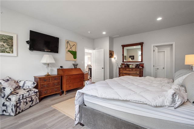 bedroom featuring light wood-type flooring