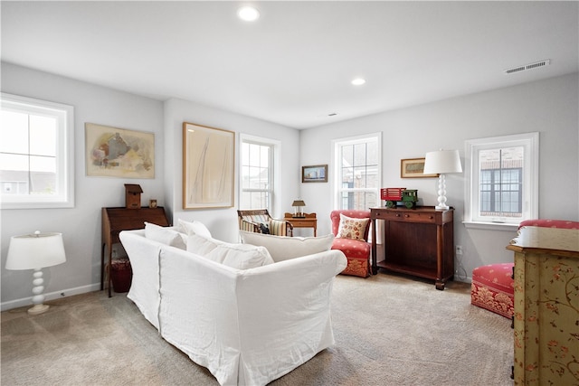 living room featuring light colored carpet