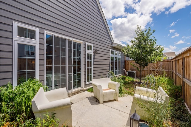 view of patio / terrace with central AC