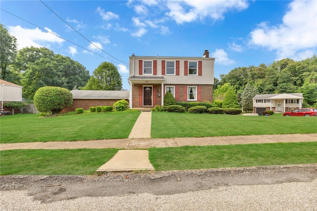 view of front of property with a front lawn