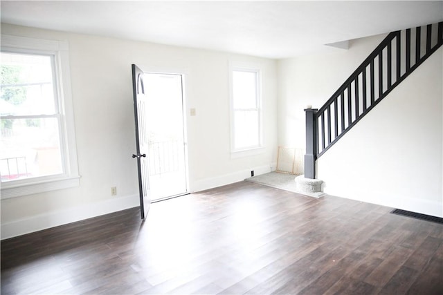 entrance foyer with dark hardwood / wood-style flooring